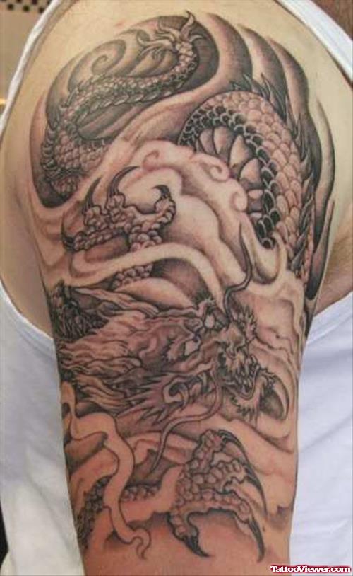 Grey Ink Dragon Half Sleeve Tattoo Design