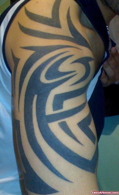 Awful Black Tribal Half Sleeve Tattoo For Men