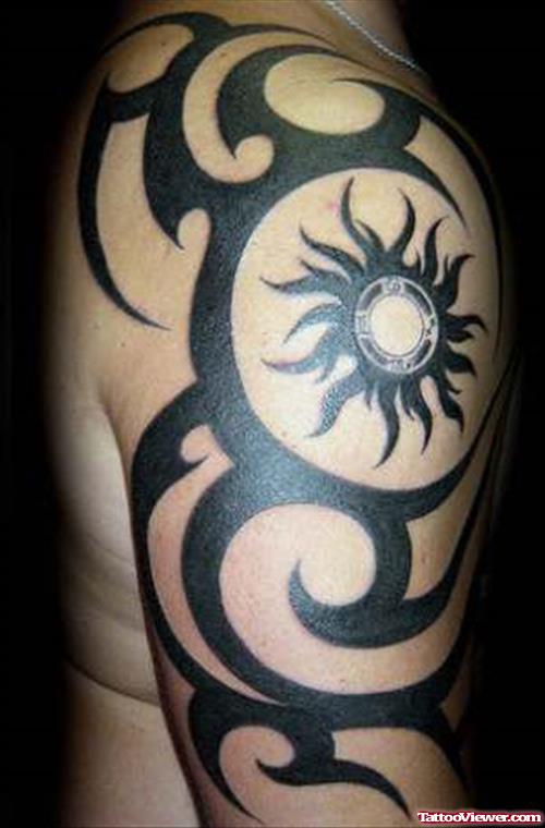 Tribal Sun And Tribal Half Sleeve Tattoo