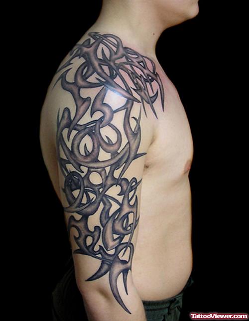 Amazing Black Tribal Right Half Sleeve Tattoo