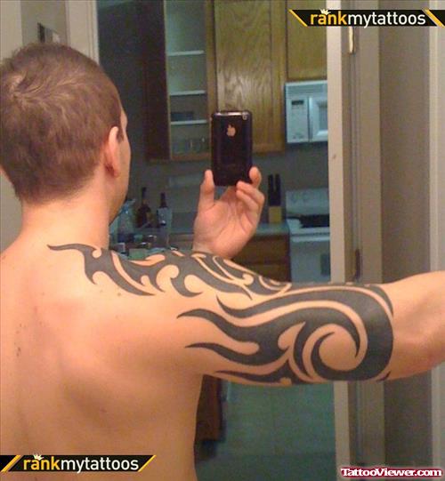 Tribal Half Sleeve Tattoo On Man Right Half Sleeve
