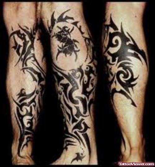Black Ink Tribal Half Sleeve Tattoo On Leg
