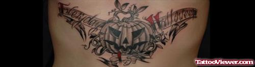 Grey Ink Pumpkin Halloween Tattoo On Chest