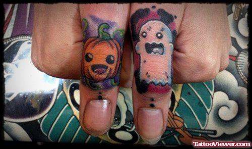 Nice Color Ink Halloween Tattoos On Both Thumbs