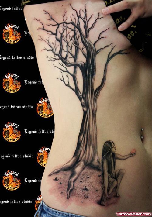 Grey Ink Tree And Halloween Tattoo On Side Rib