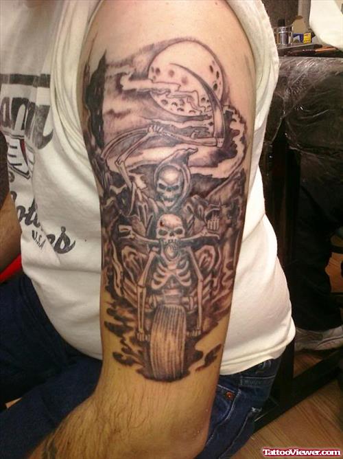 Awesome Grey Ink Halloween Tattoo On Man Left Half Sleeve