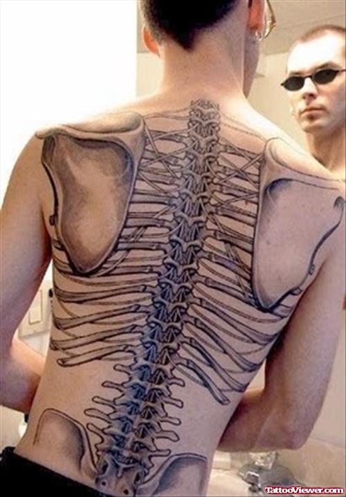 Grey Ink Skeleton Halloween Tattoo On Back
