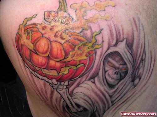 Flaming Pumpkin In Nightmare Hand Halloween Tattoo