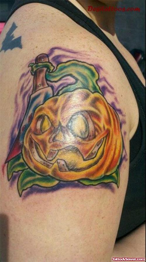 Colored Halloween Pumkin Tattoo On Right Shoulder