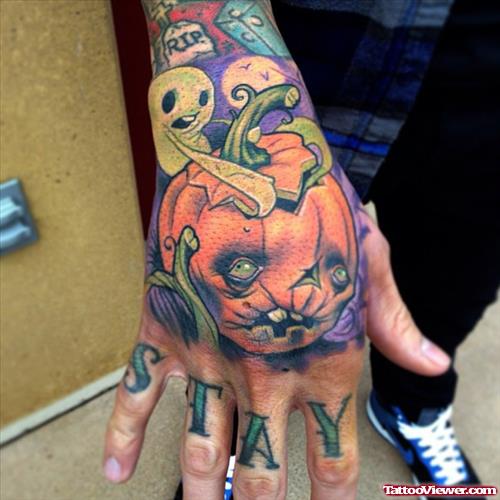 Color Ink Halloween Tattoo On Man Right Hand
