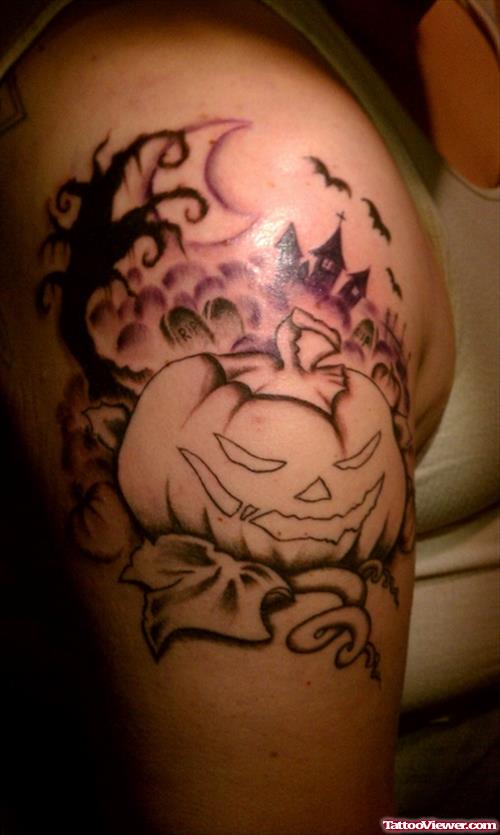 Grey Ink Halloween Pumpkin Tattoo On Right Shoulder