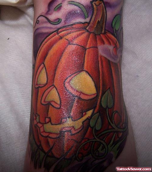 Color Ink Pumpkin Halloween Tattoo On Sleeve