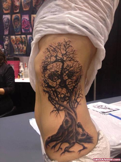 Grey Ink Tree Halloween Tattoo On Side Rib