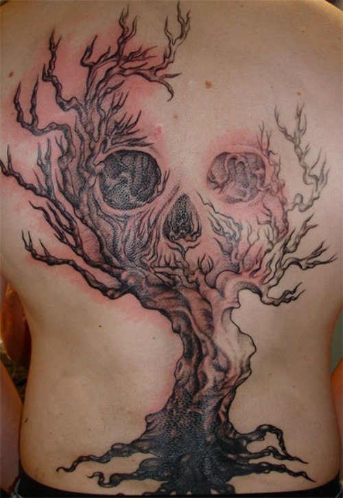 Grey Ink Skull And Tree Halloween Tattoo On Back