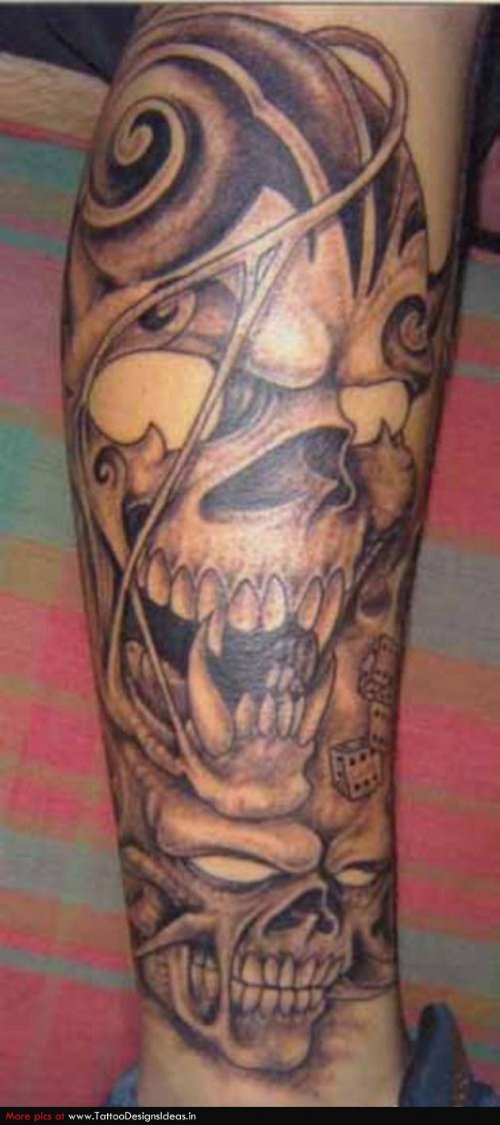 Grey Ink Skull Halloween Tattoo On Leg