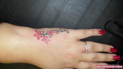 Pink Flowers Hand Tattoo For Girls