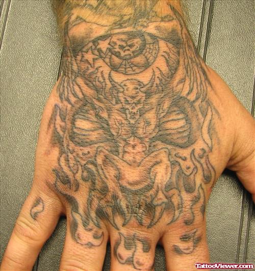 Grey Ink Scary Tattoo On Right Hand