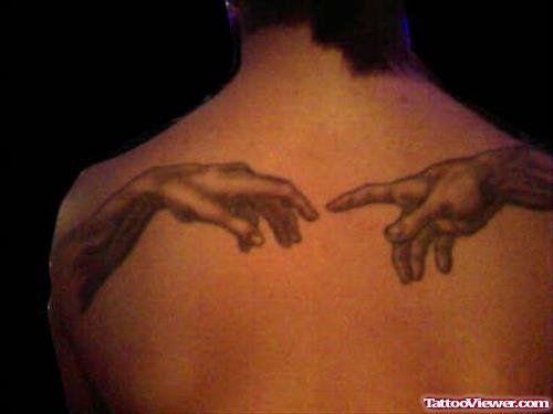 Grey Ink Hands Tattoos On Back