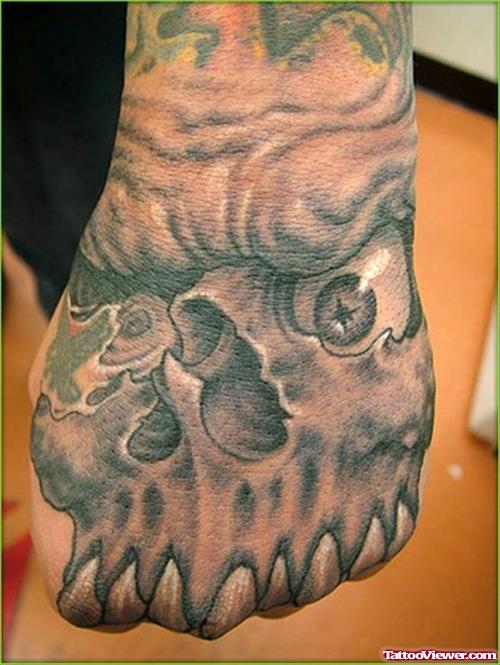 Grey Ink Skull Left Hand Tattoo