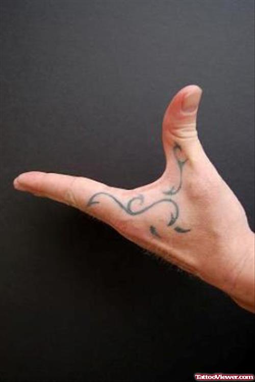 Black Ink Tribal Left Hand Tattoo