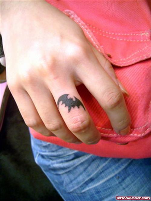 Black Ink Bat Tattoo On Right Hand Finger