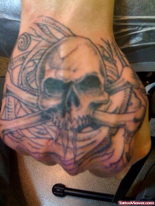 Amazing Grey Ink Skull With Bones Tattoo On Right Hand