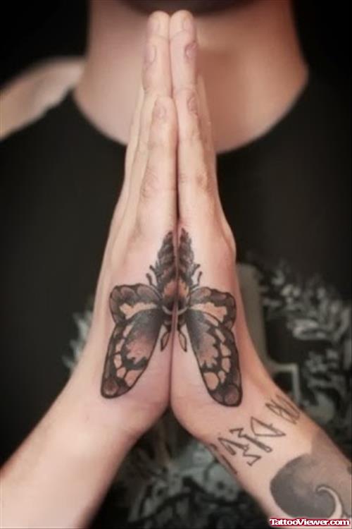Grey Ink Butterfly Hand Tattoos