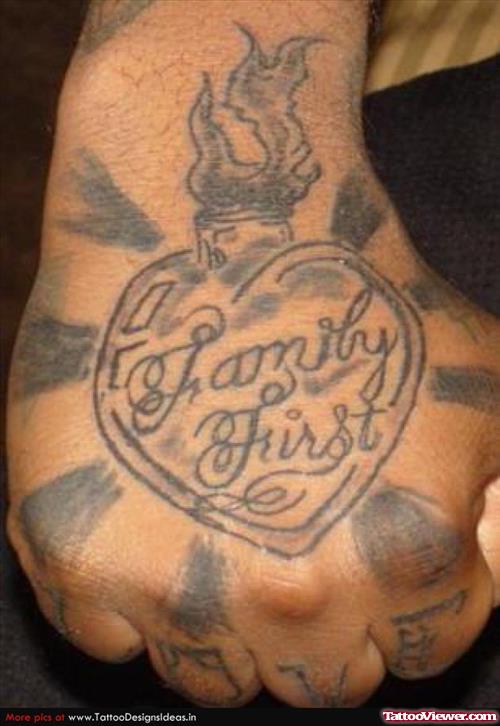 Family First Burning Heart Hand Tattoo