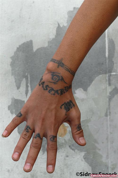 Classic Black Ink Tribal Hand Tattoo