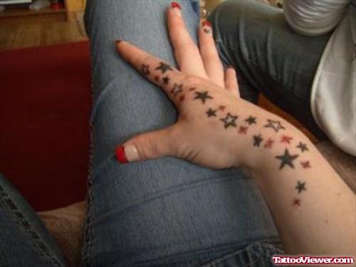 Stars Tattoos On Girl Right Hand