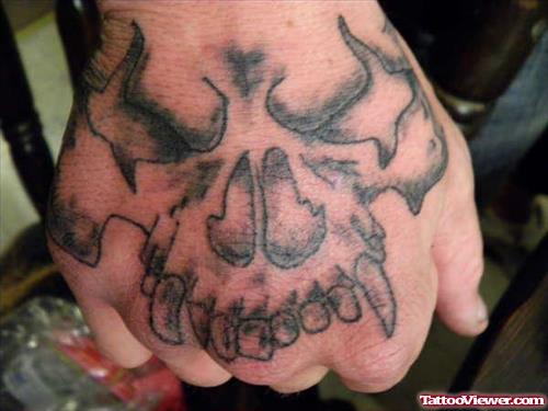 Demon Skull Hand Tattoo