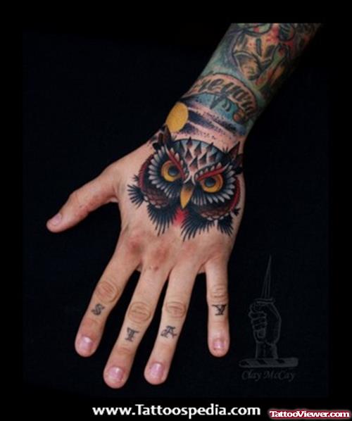 Colored Owl Head Hand Tattoo