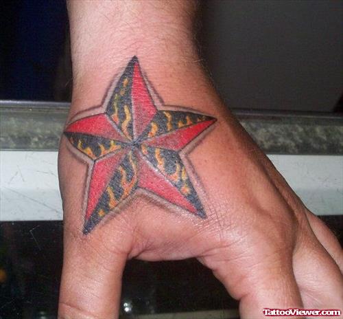 Color Nautical Star Hand Tattoo