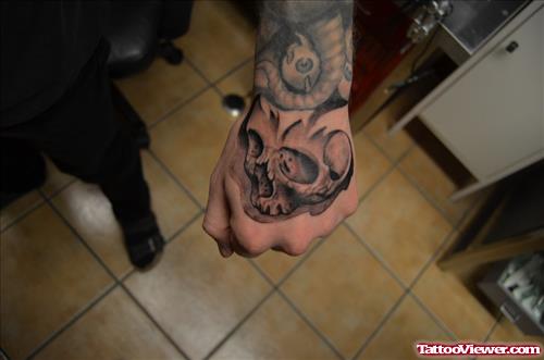 Beautiful Grey Ink Skull Left Hand Tattoo