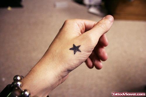 Awesome Star Hand Tattoo