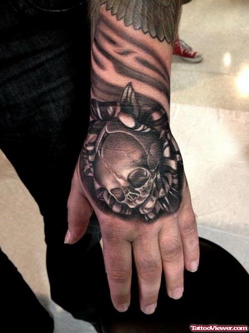 Awesome Grey Ink Skull Left Hand Tattoo