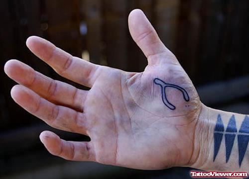 Guy Showing His Hand Tattoo