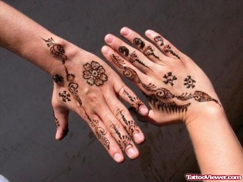 Grey Ink Henna Flowers Hand Tattoo