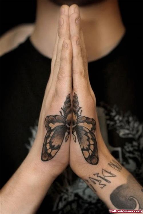 Grey Ink Butterfly Side Hand Tattoo