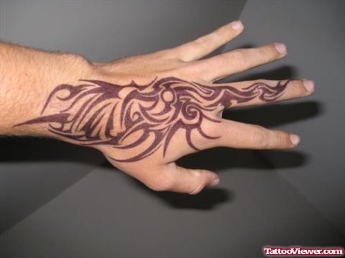 Cool Tribal Hand Tattoo