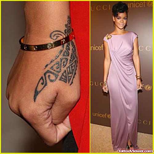 Awesome Rihanna Tribal Hand Tattoo