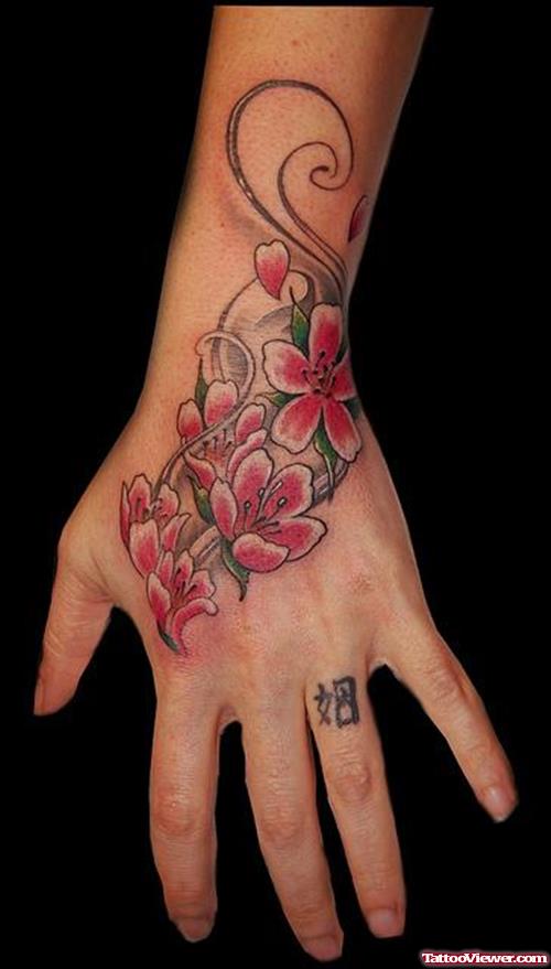 Color Flowers Hand Tattoo