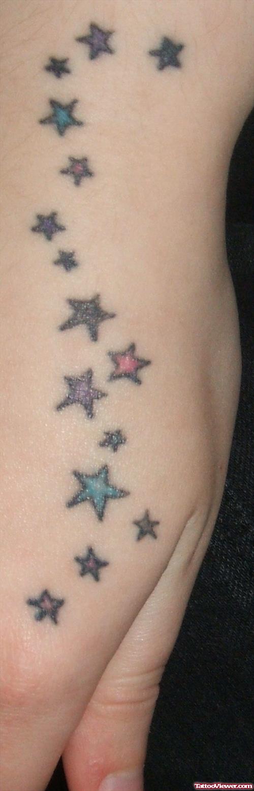 Colored Stars Hand Tattoo