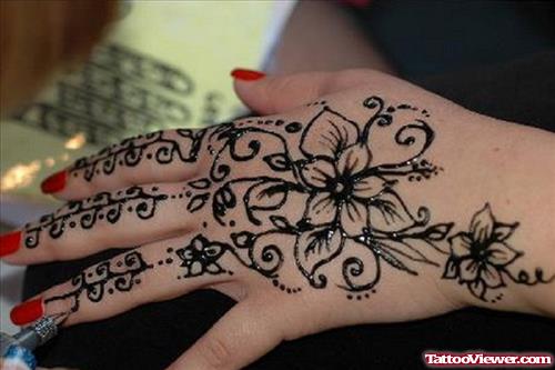 Black Ink Henna Flowers Hand Tattoo