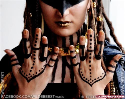 Black Ink Devil Tribal Hand Tattoos