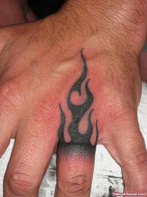 Black Tribal Flame Hand Tattoo