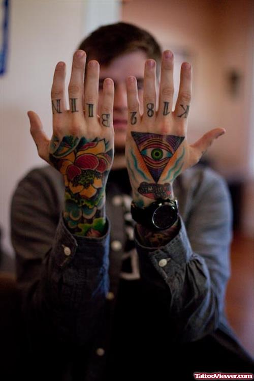 Colored Flower And Illuminati Eye Tattoo On Both Hands
