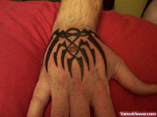 Black Tribal Hand Tattoo