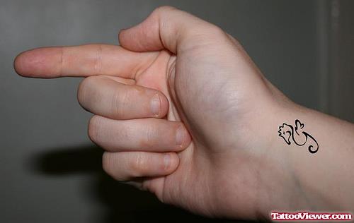 Black Small Dragon Tattoo On Right Wrist