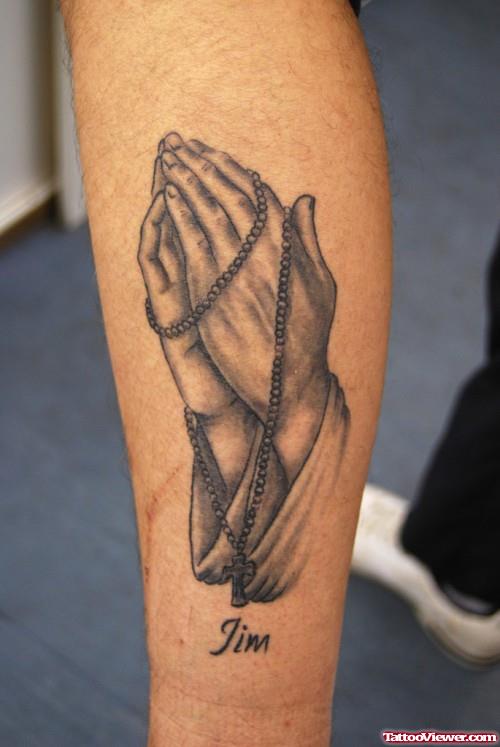 Grey Ink Rosary and Praying Hands Tattoo On Leg